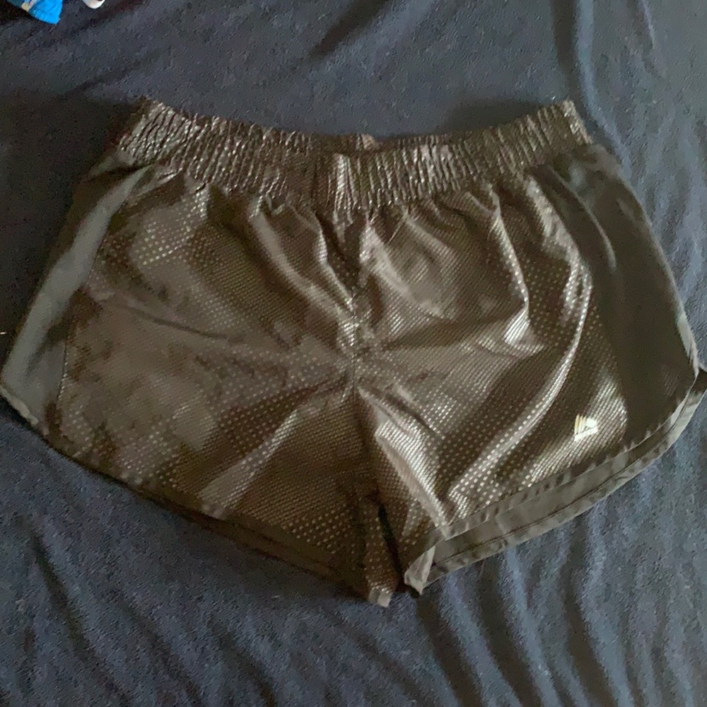 Black running shorts with metallic pattern